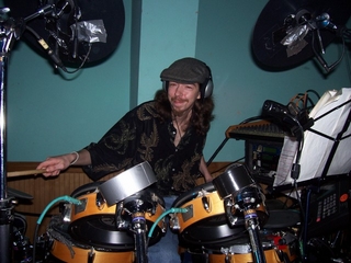 Chris filling in on drums
